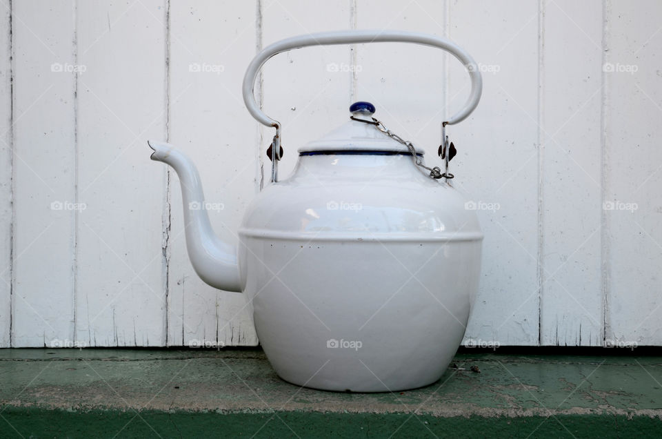 A vintage enamel teapot 