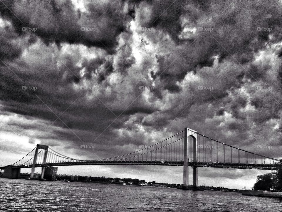 Bridge under storm clouds