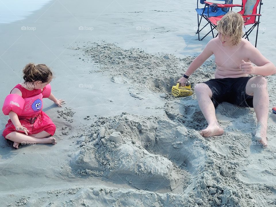 kids in the sand