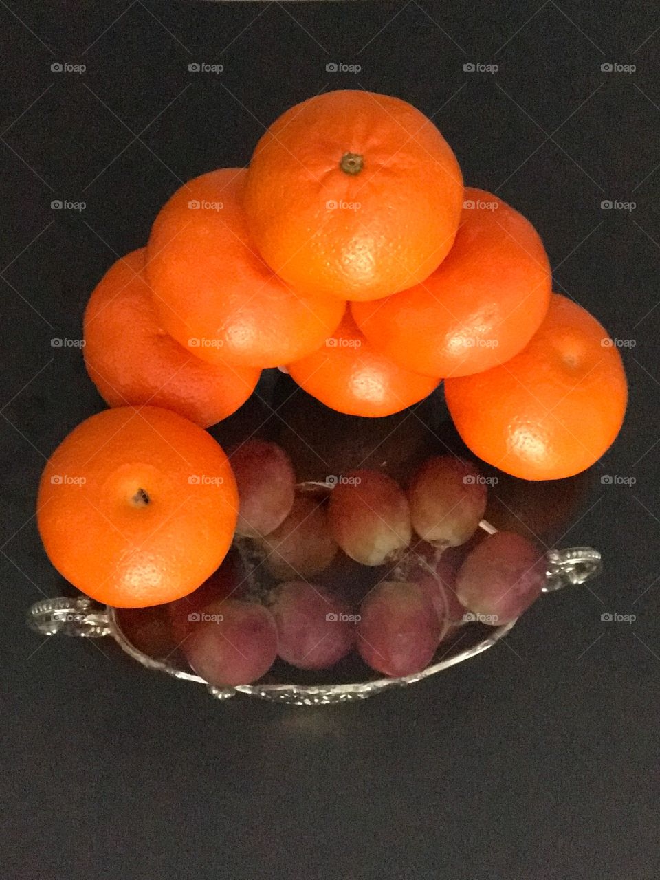 High angle view of a grape and orange