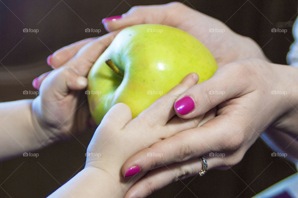 Girl holding fruits and vegetables