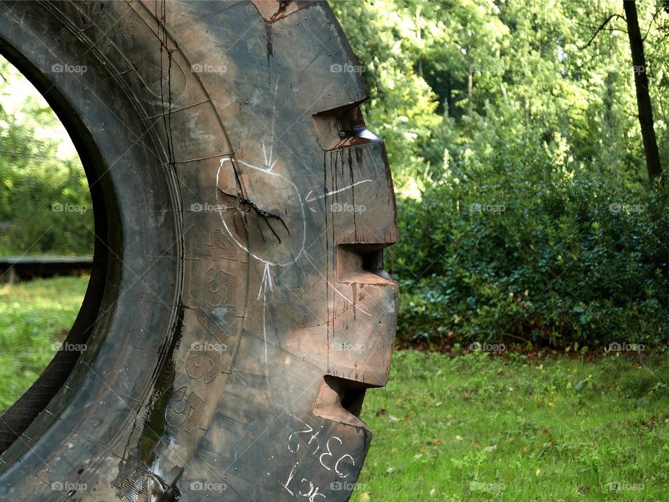 Big tire as art in a park