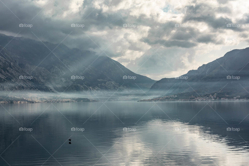 Kotor bay in sun rays