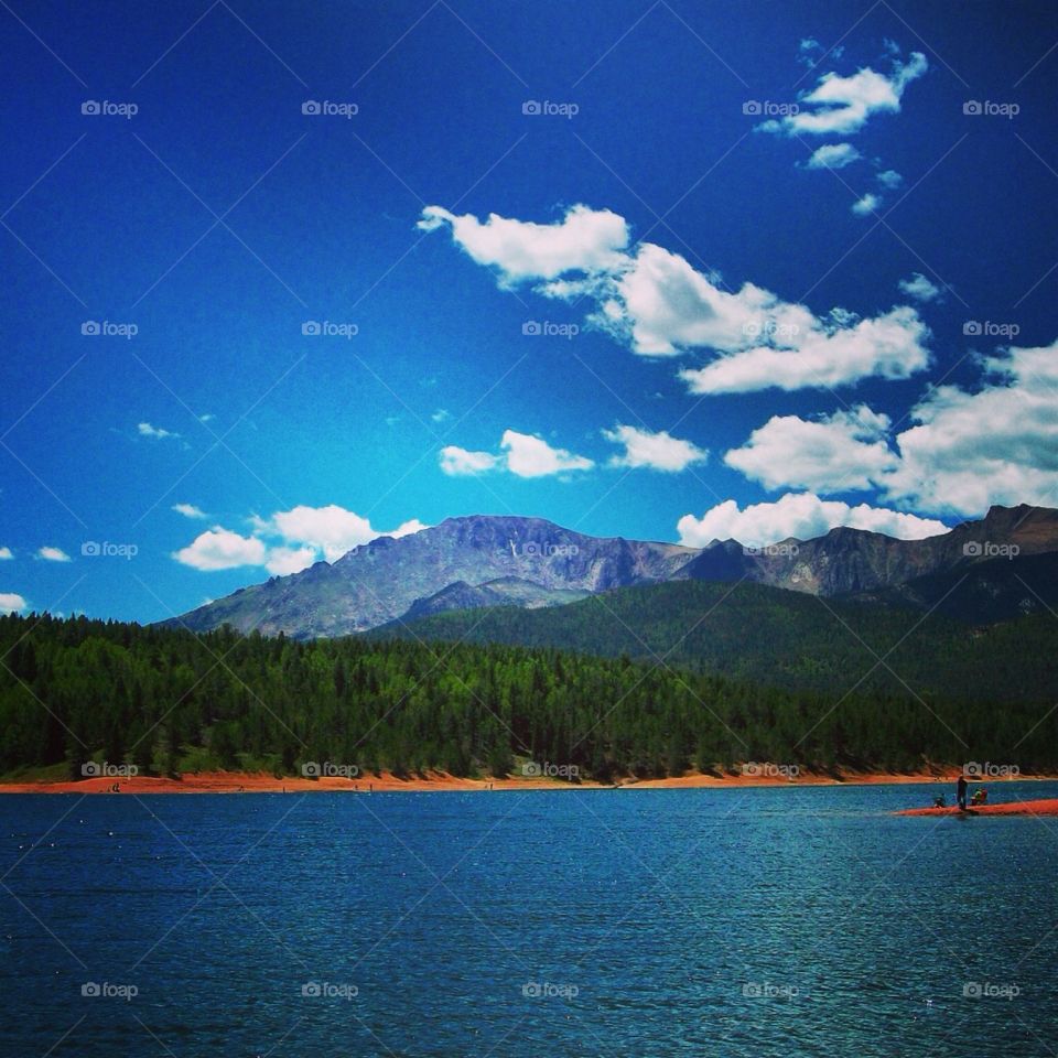 Pikes peak. This was taken at the bottom of pikes peak at one of the reservoirs. The mountain top in the distance is pikes peak 