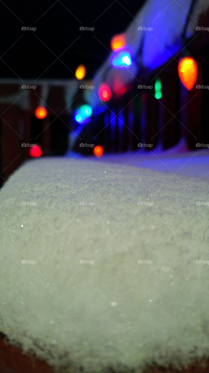 Christmas lights in the snow
