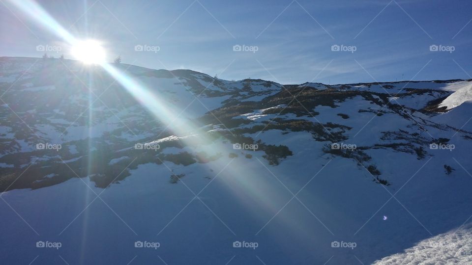 Sunshine above snow