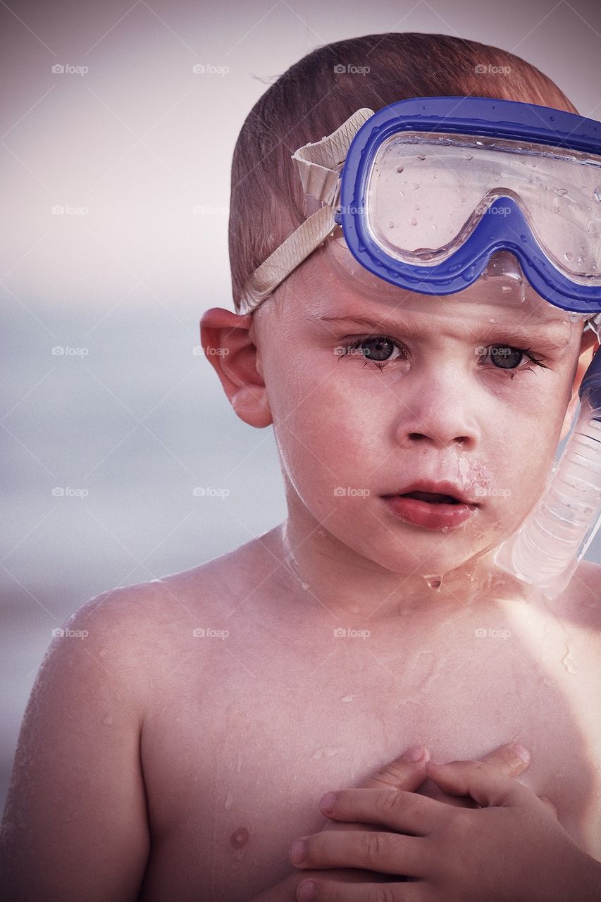 Boy bathing in the sea