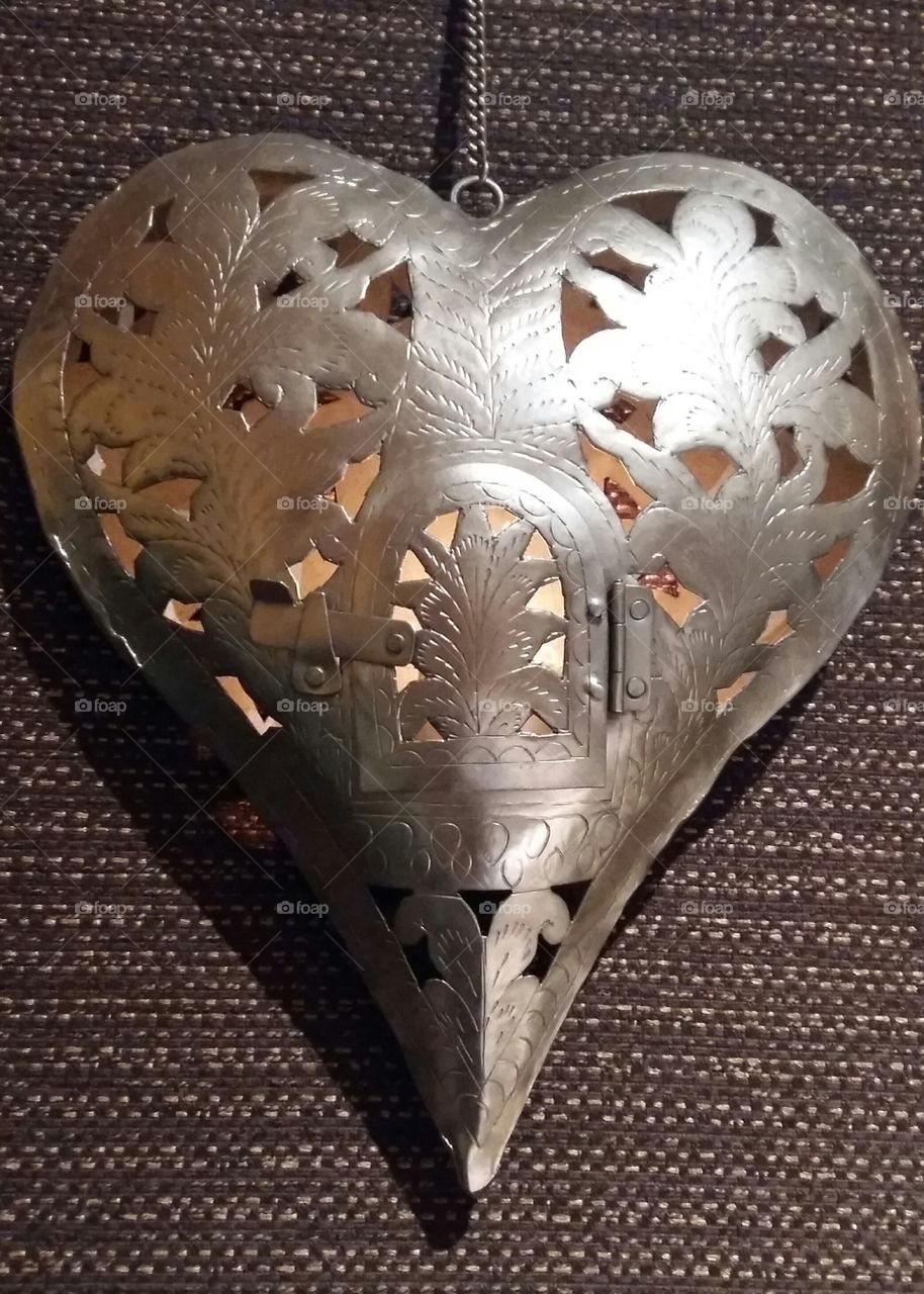 home heart decoration with a Light candle inside. Let you bedroom shin of love! Metal heart doesn't ever means col heart!