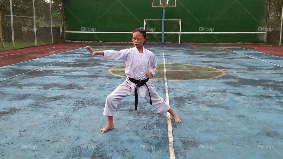 my daughter practicing karate