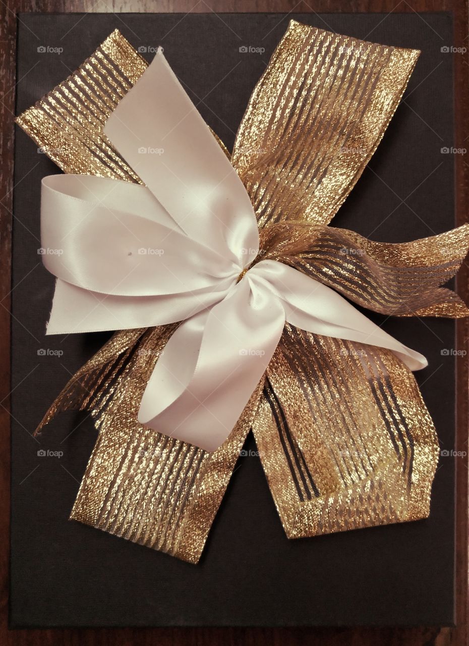 Gift box with golden ribbon