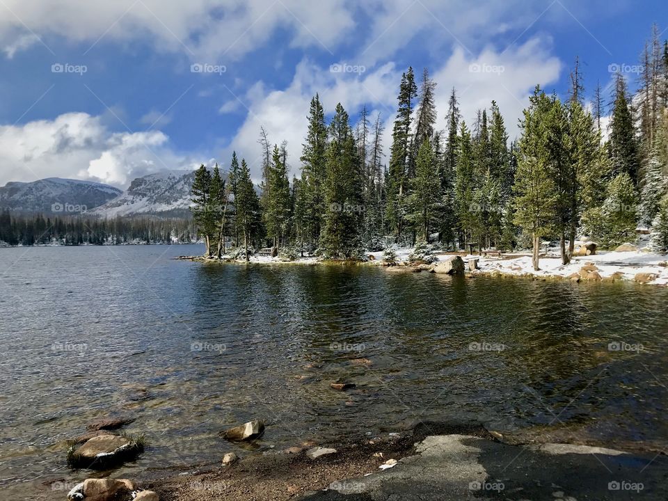 Scenic view of Mirror Lake with one of the first snow falls of the season in the Uinta Mountains, Utah