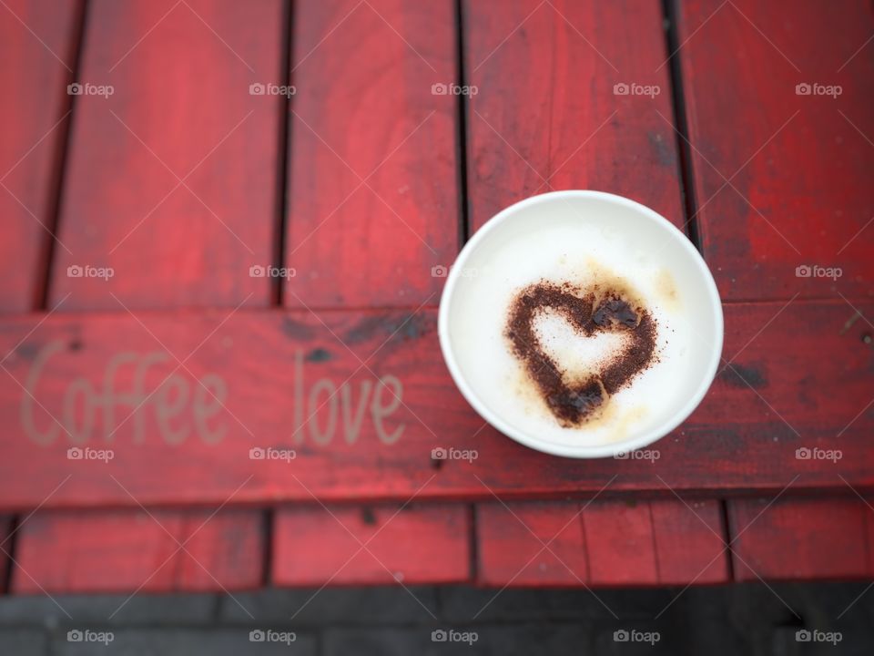 Coffee Love - Cup of Coffee with chocolate heart on red wooden Box 