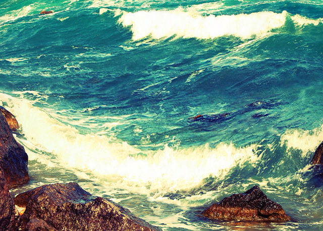 blue waves rock beach by tinasha