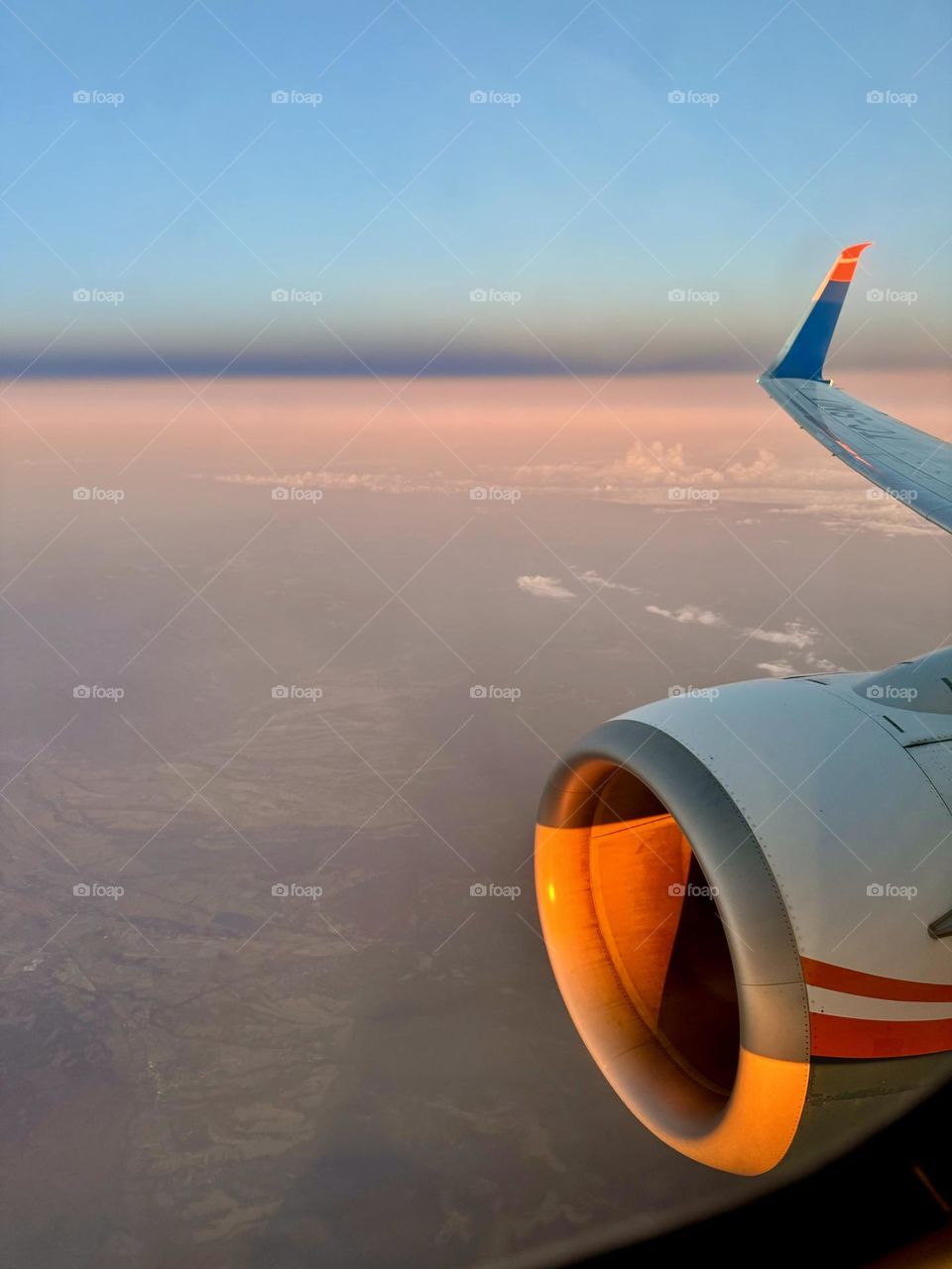 An airplane flying over the sea