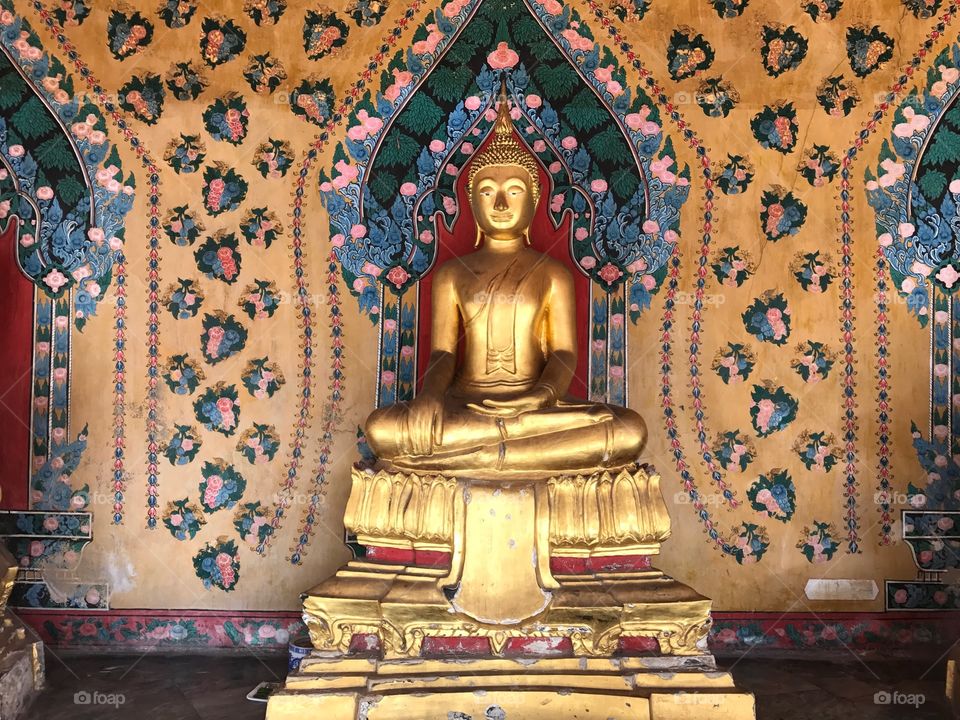 A golden statue of buddah in thailand