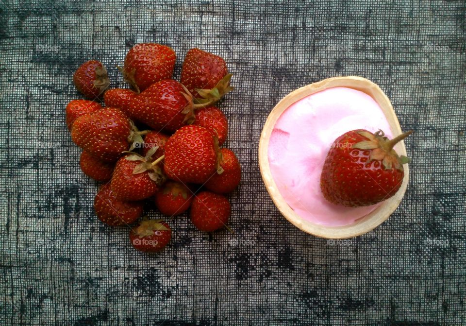 red strawberries and ice cream