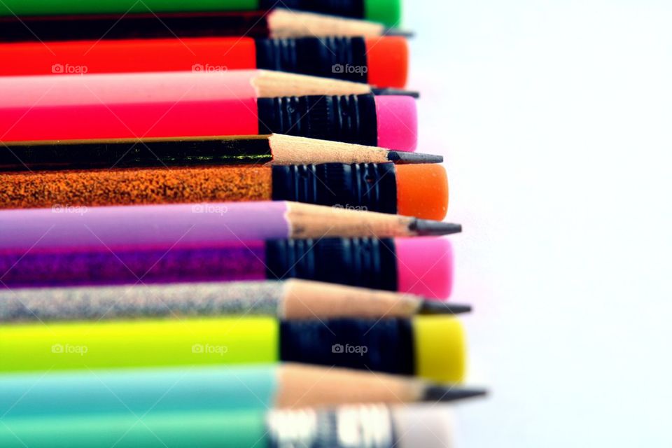 colorful pencils and erasers