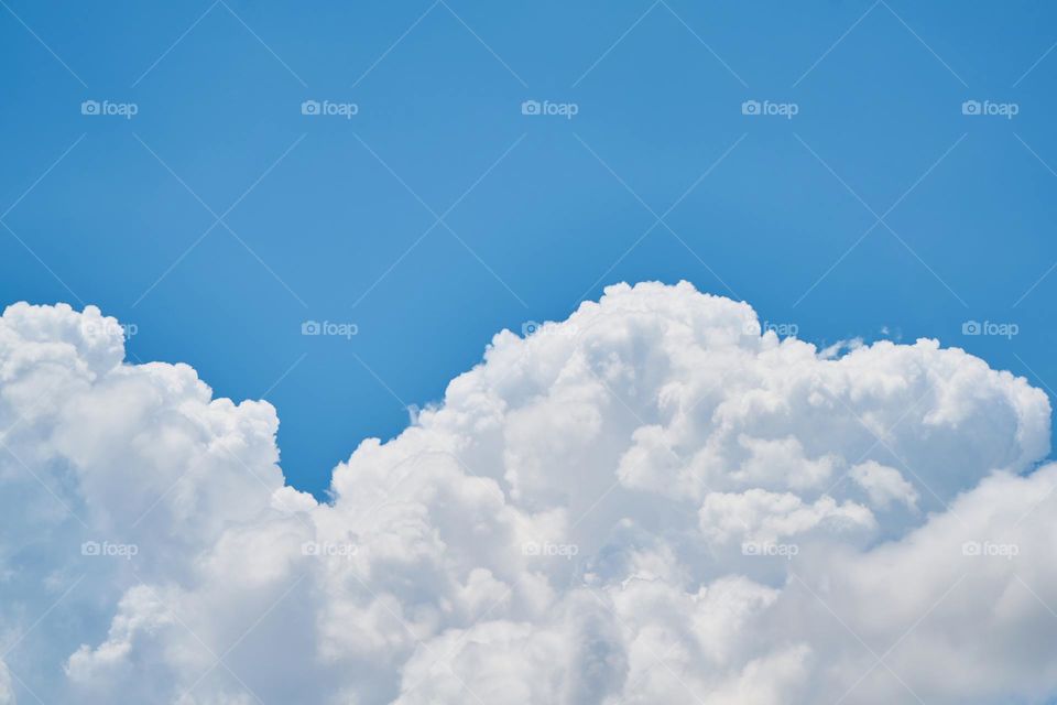 Air Blue Sky with White clouds