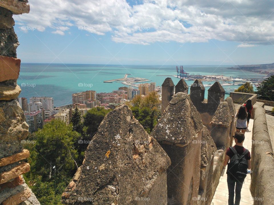 On top of a moorish castle in malaga andalucia spain with mediterranean sea and port