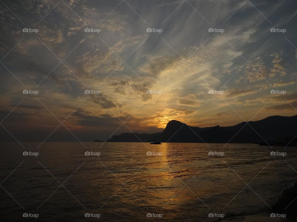 Clouds over the sea at sunset