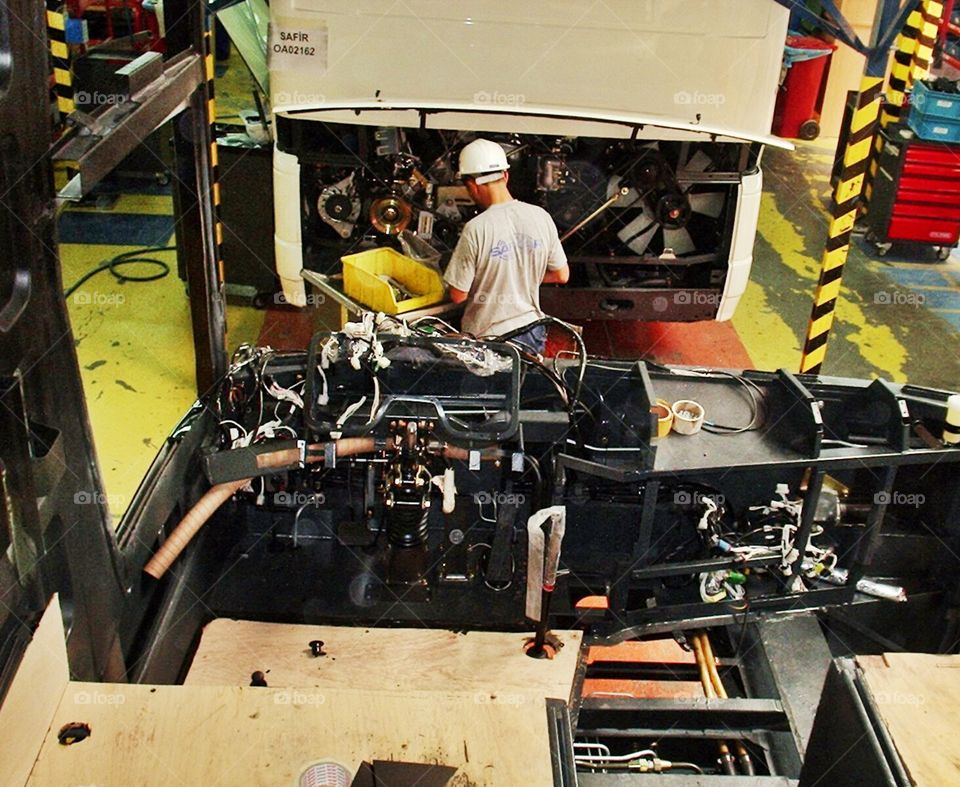 engineer on work. I took this photo in a bus factory in Turkey.