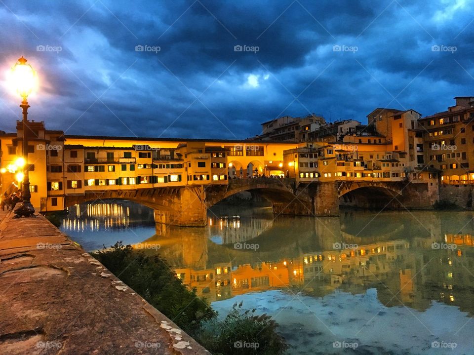 Ponte vecchio over arno river in Florence, Italy