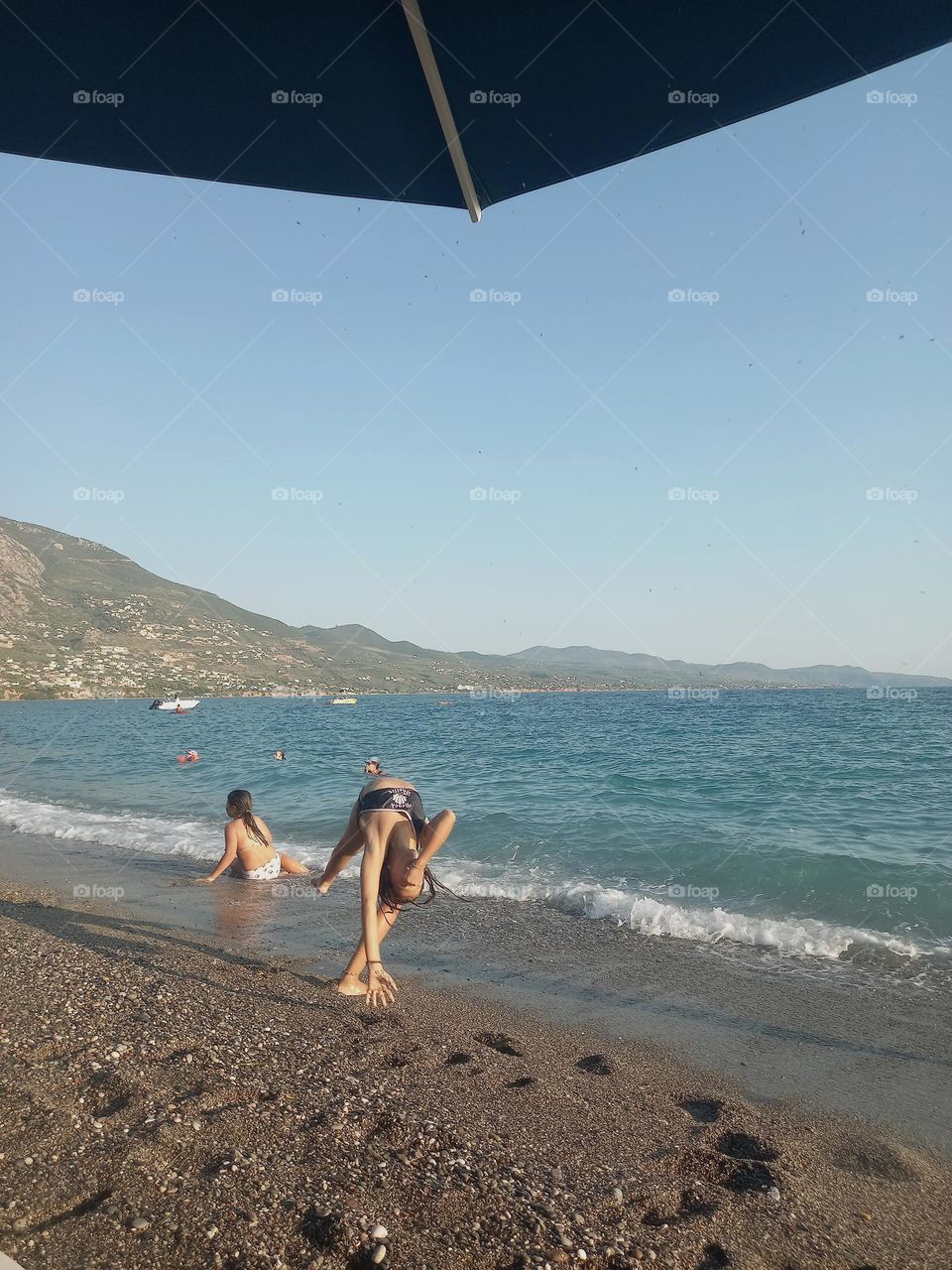 A strange body position at the beach