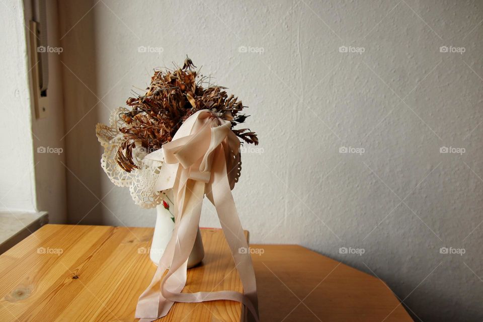 Close up of flowers in a vase in living room