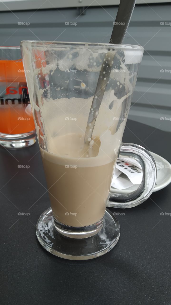 half drinked cappuccino