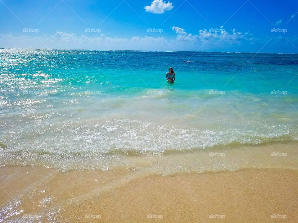 Wading in the sea in Akumal