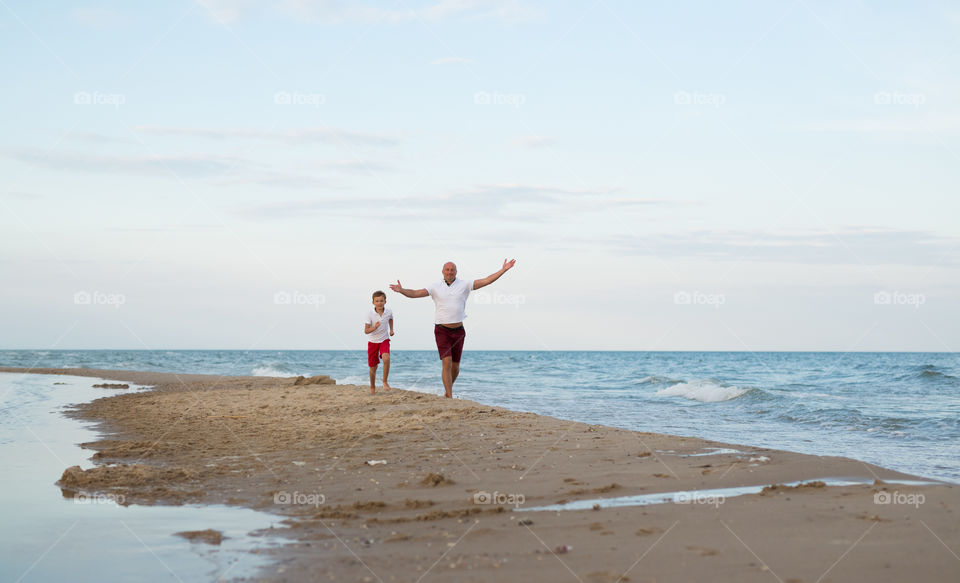 happy son and father after quarantine came to morb, freedom, happiness, joy, life.  running around and having fun that they were able to leave the house