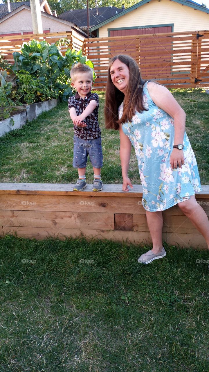 A portrait of a woman and a little boy 