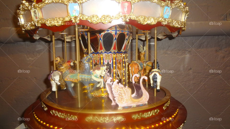 A small carousel with horses