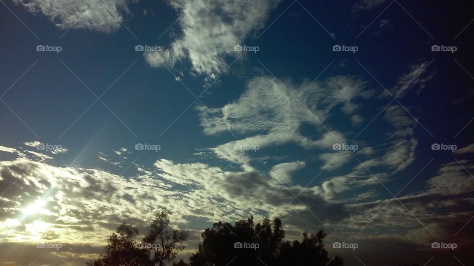 Sunset and Scattered Clouds