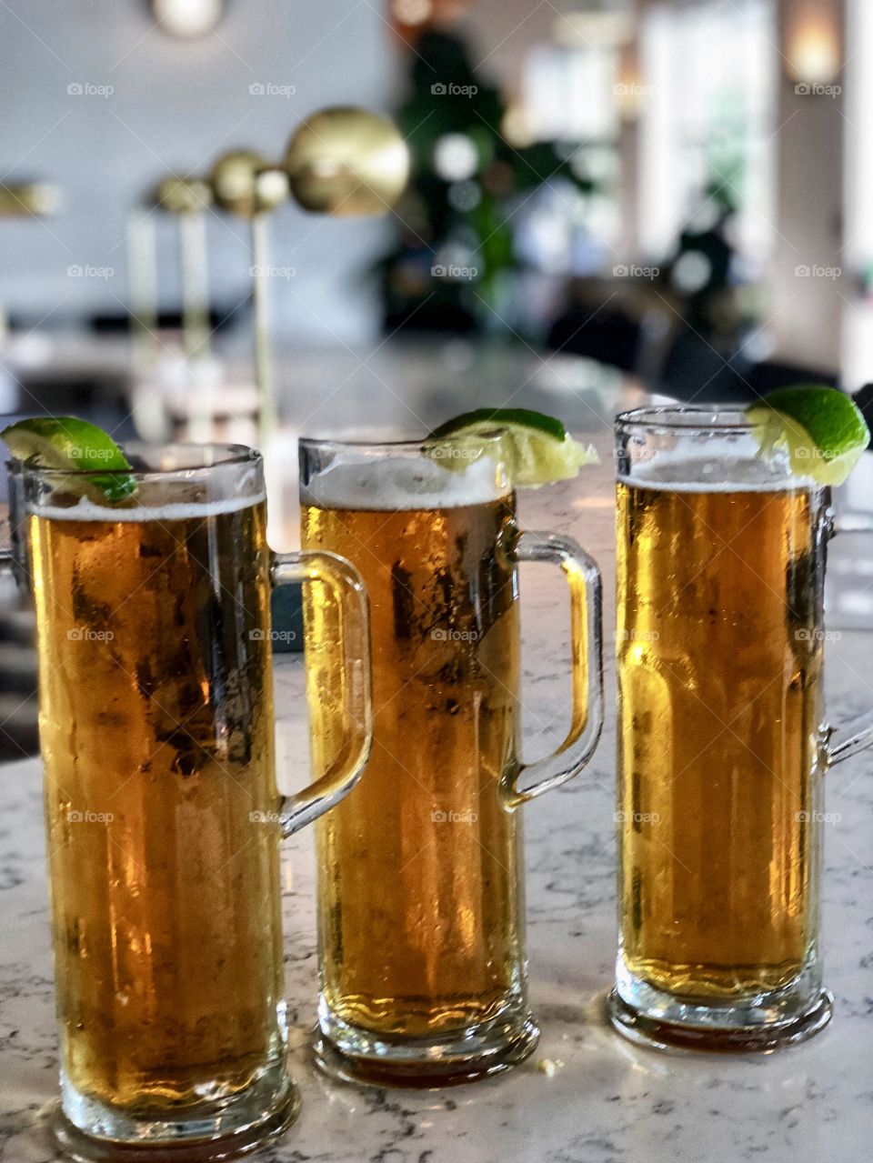 Ice cold Beer in Tall Mugs! Hanks in Austin, Texas Lifestyle Photo!