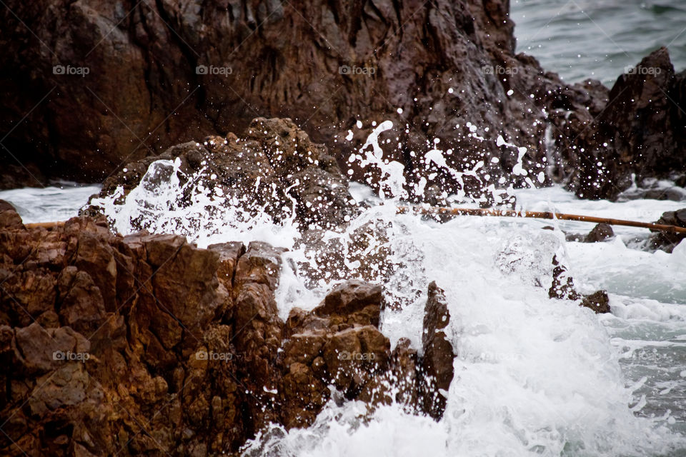 waves on the rock