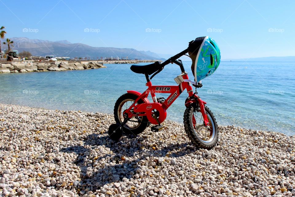 Child bicycle on a beach