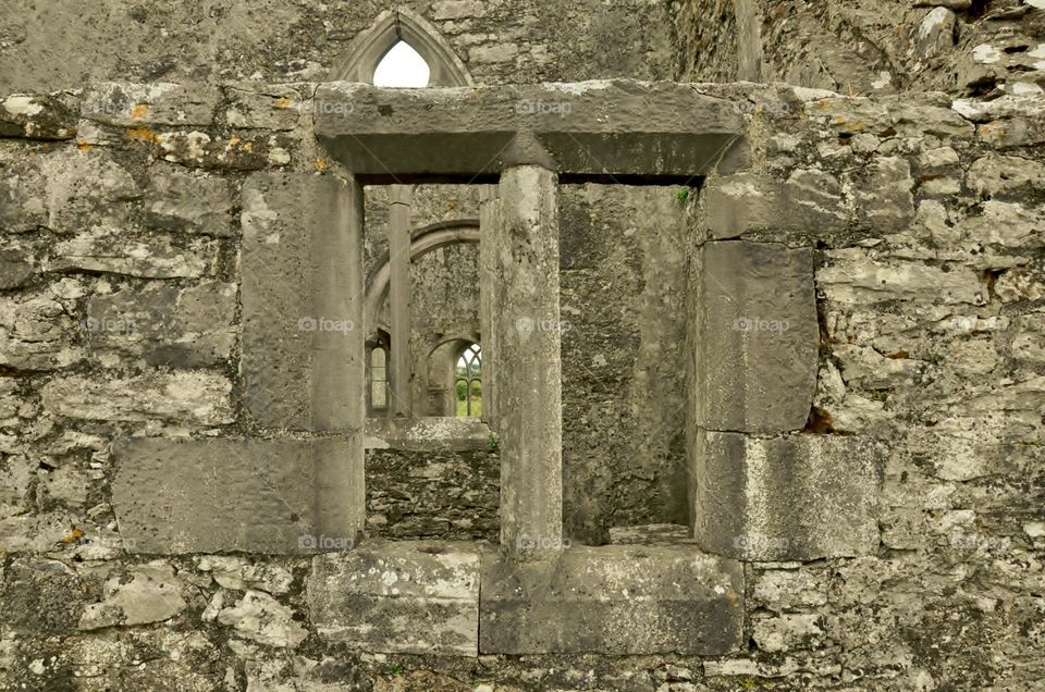 View through the window of ancient Irish ruins 