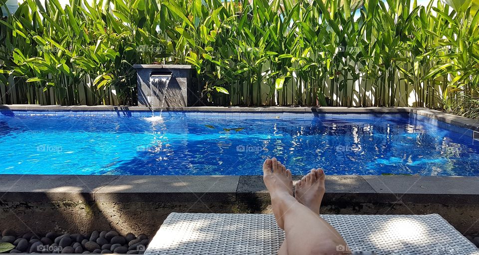 relaxing by the pool