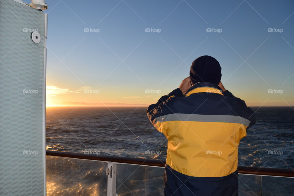 Rear view of man in cruise