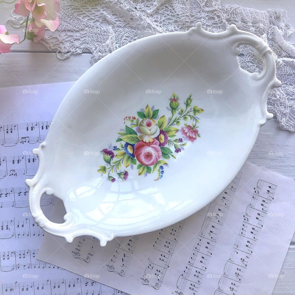 Antique French porcelain dish with floral ornament and handles