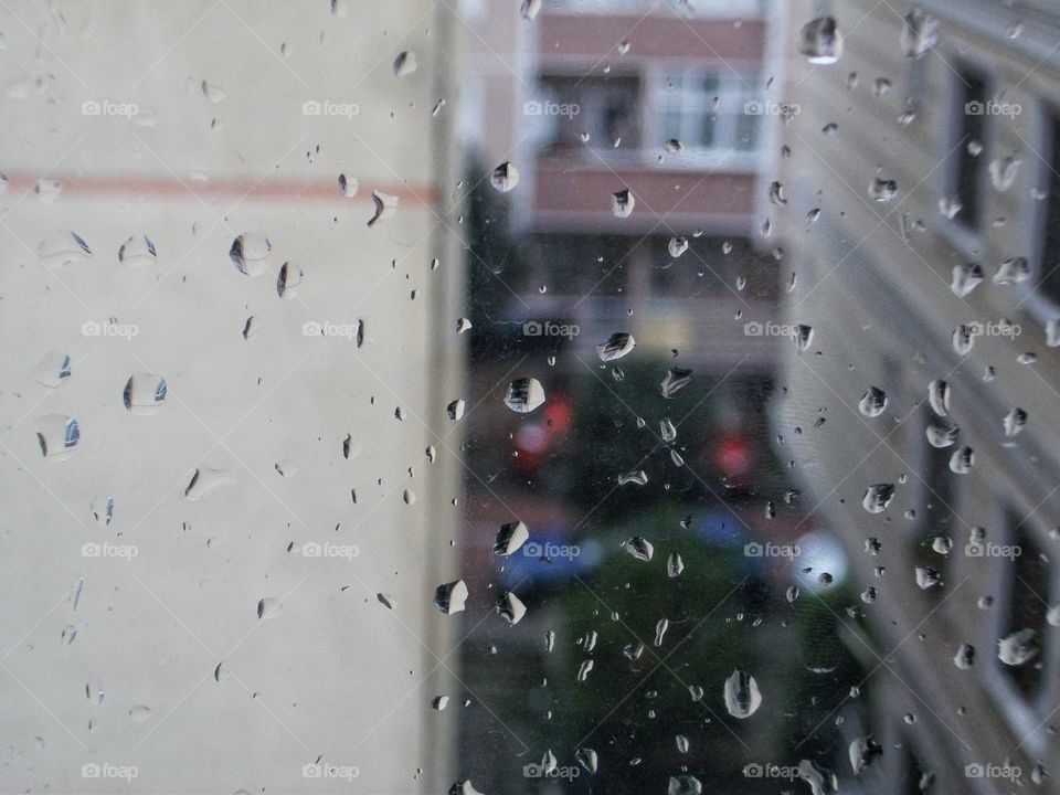 A window after rain. Captured these raindrops. Zoomed all the way. ☺ Taken with FUJIFILM J30.
