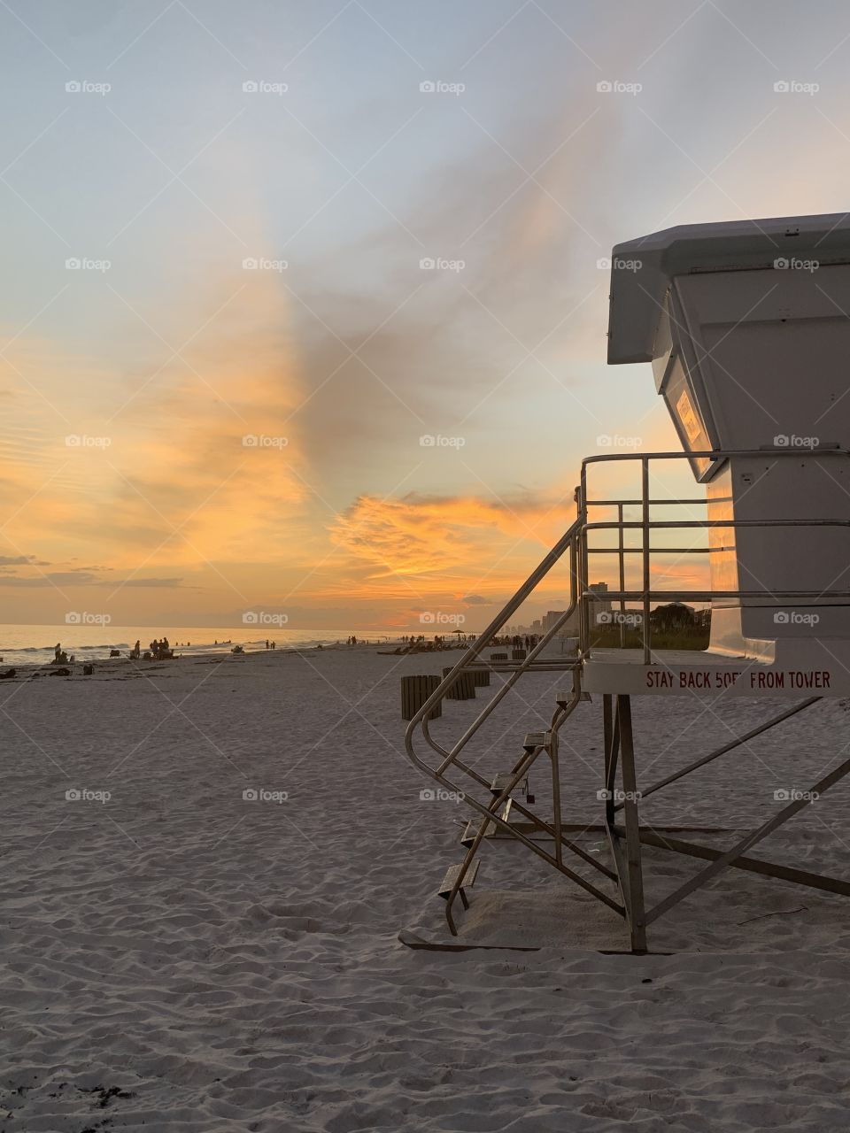 Sunset photo with life guard station on right.