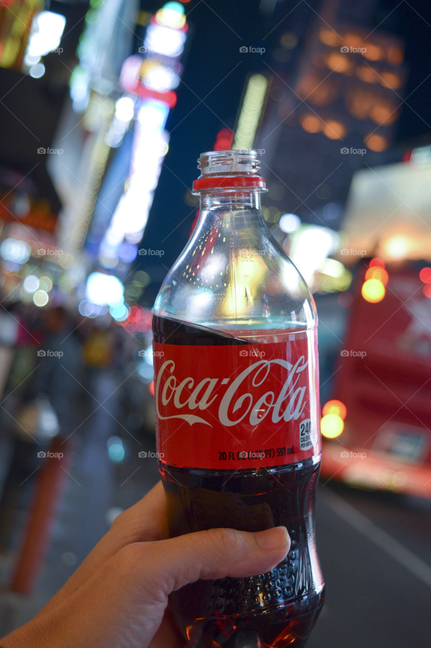 Coke in front of City Lights