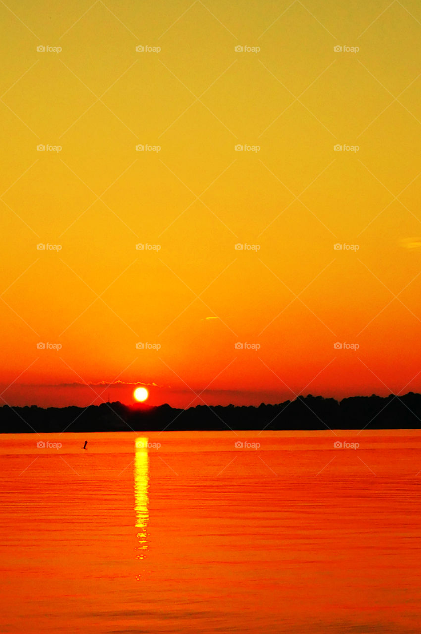 Bright sunset over the lake