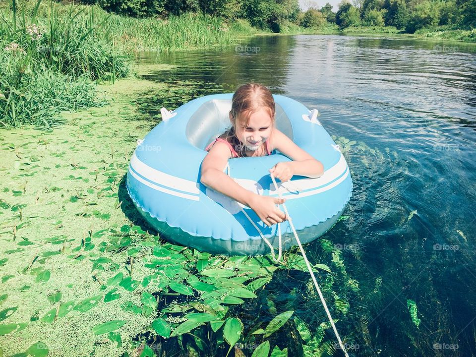 Little girl in raft