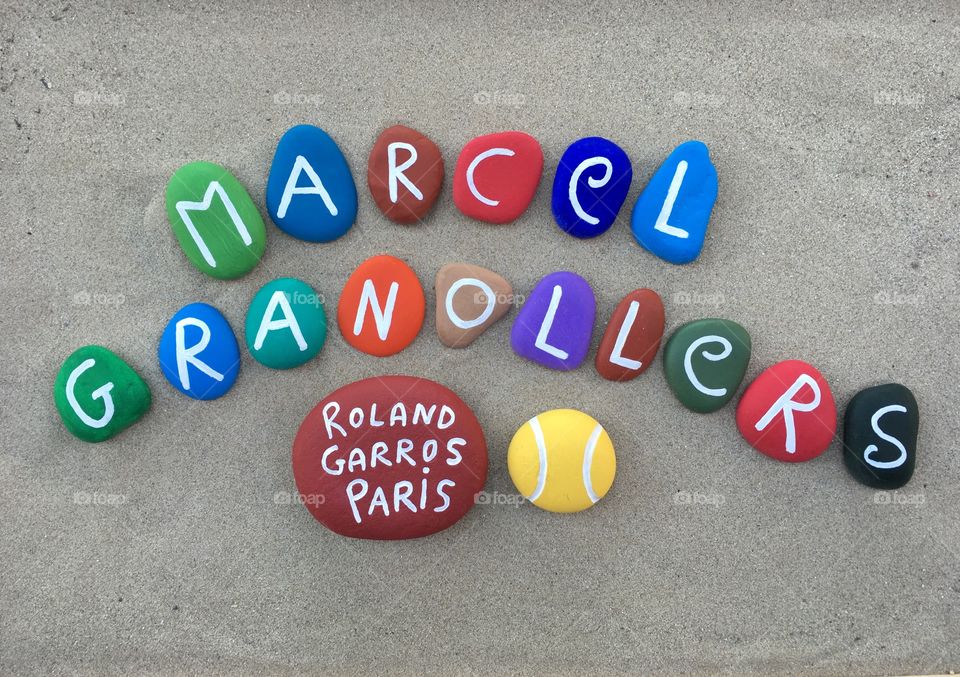 Marcel Granollers, spanish professional tennis player at Roland Garros, souvenir on colored stones 