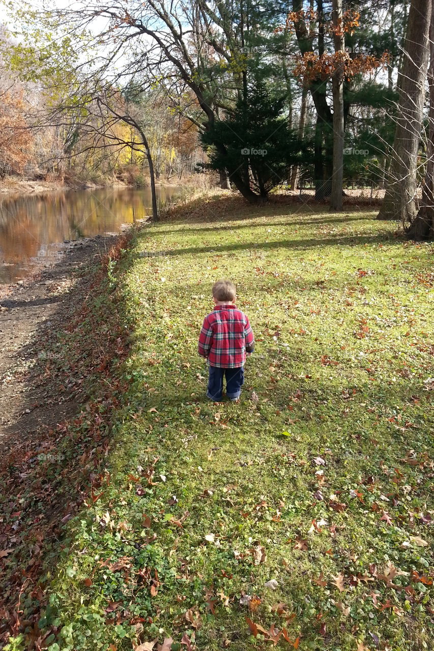 Toddler at the park in the fall