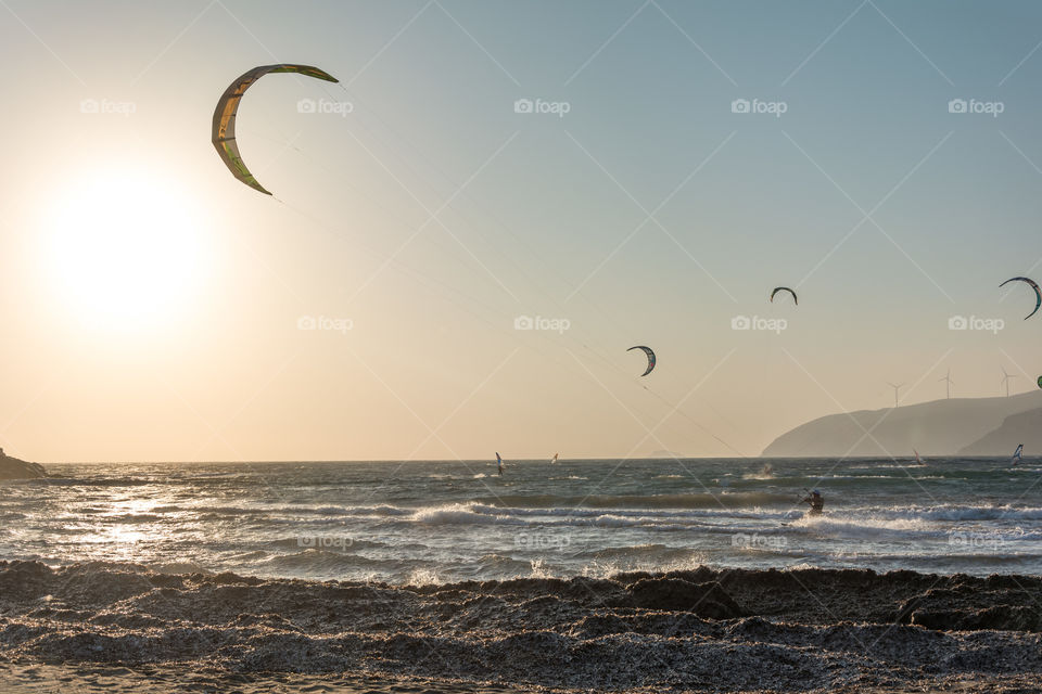 kitesurfing at sunset