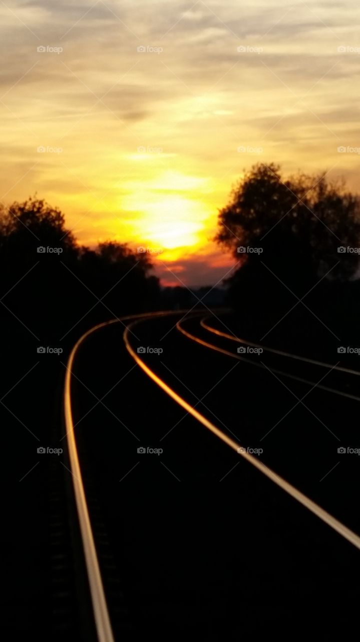 Sunset railroad tracks. The sun was setting and reflecting on the railroad tracks!